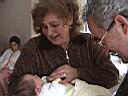 Grandfather and Grandmother enjoying the Grandson :)